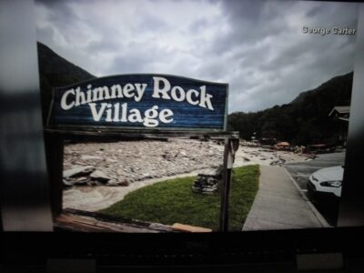 Chimney Rock Village sign, after flood